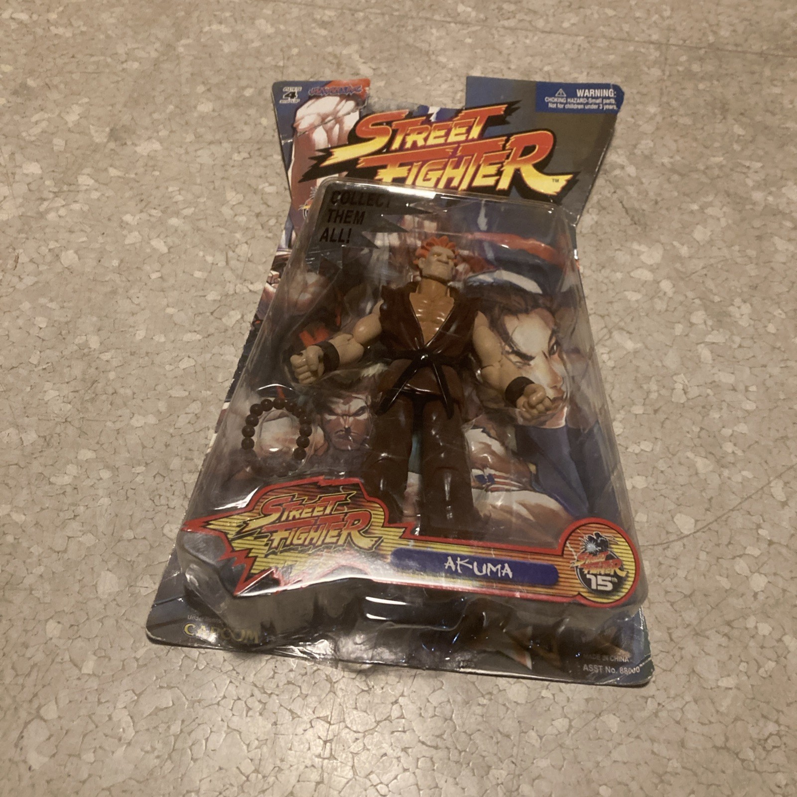 Jazwares Street Fighter Akuma Action Figure in box used 6.5 x 4 inches