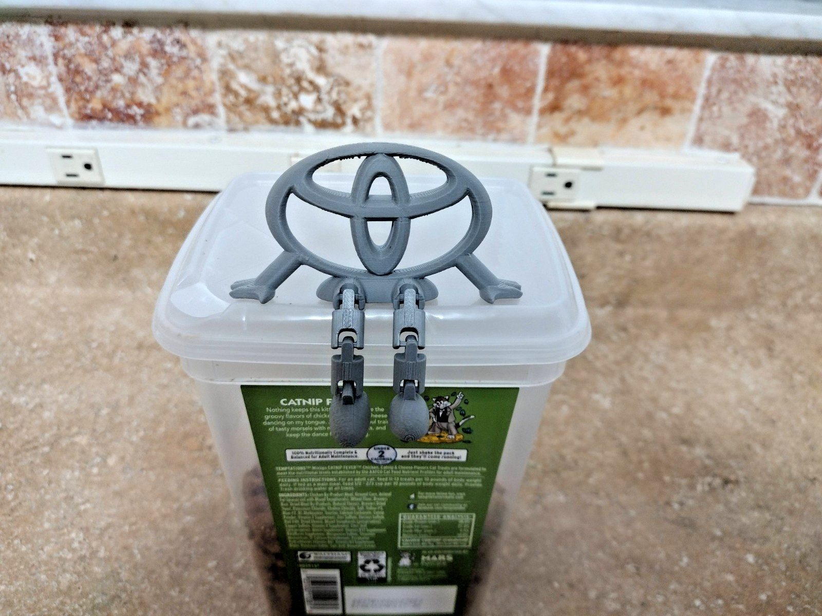 3D Printed Toyota Logo Articulated Desk Toy Figure Gray PLA Decor