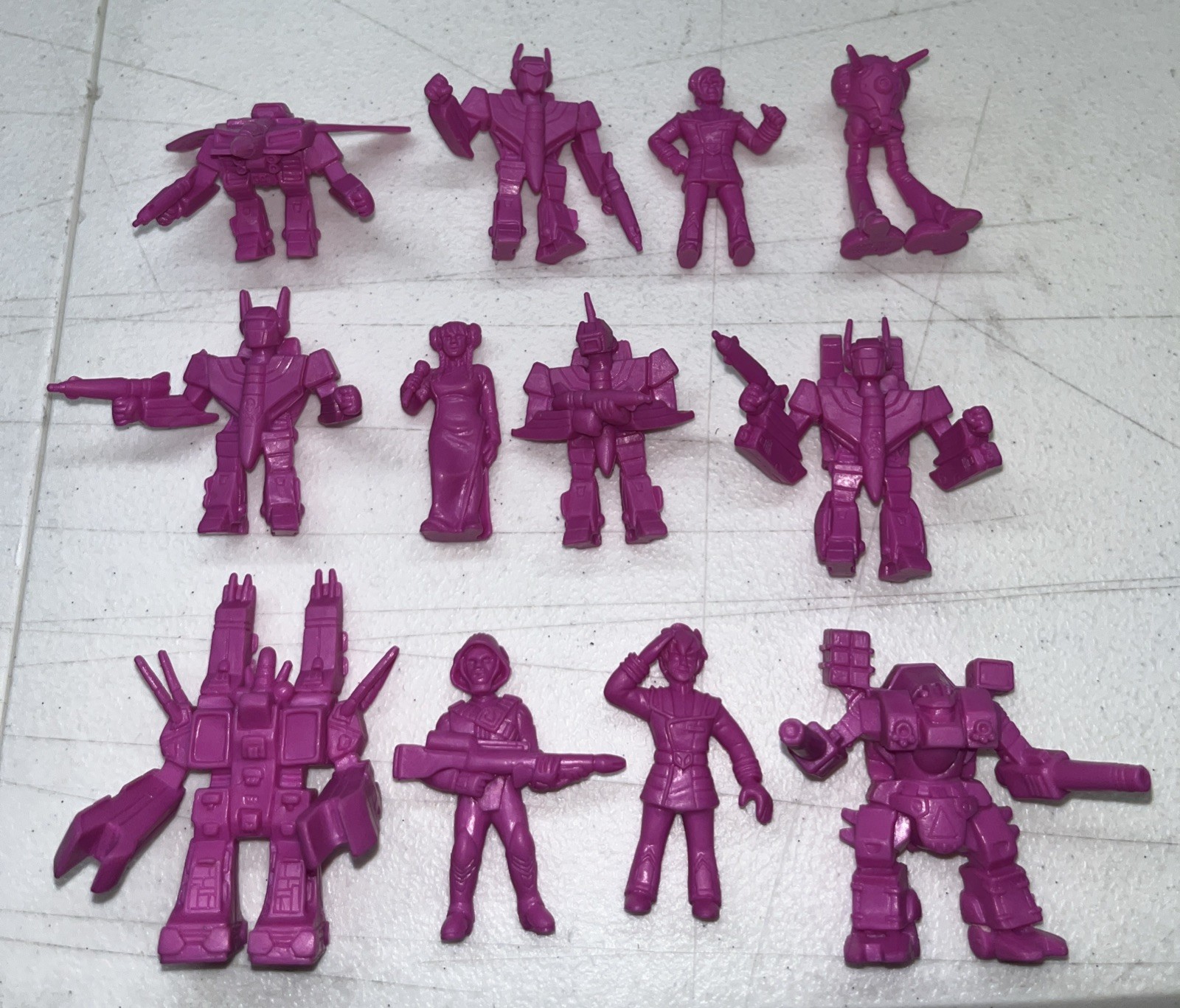 Super 7 robotech M.U.S.C.L.E. trashcan full set of 12 figures in purple, 2018