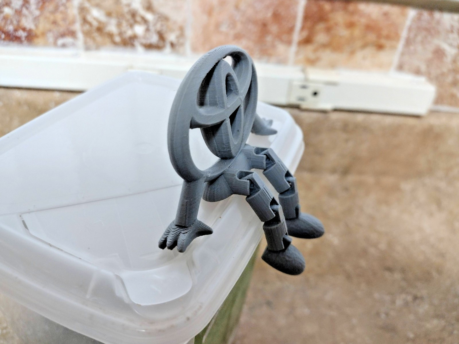 3D Printed Toyota Logo Articulated Desk Toy Figure Gray PLA Decor