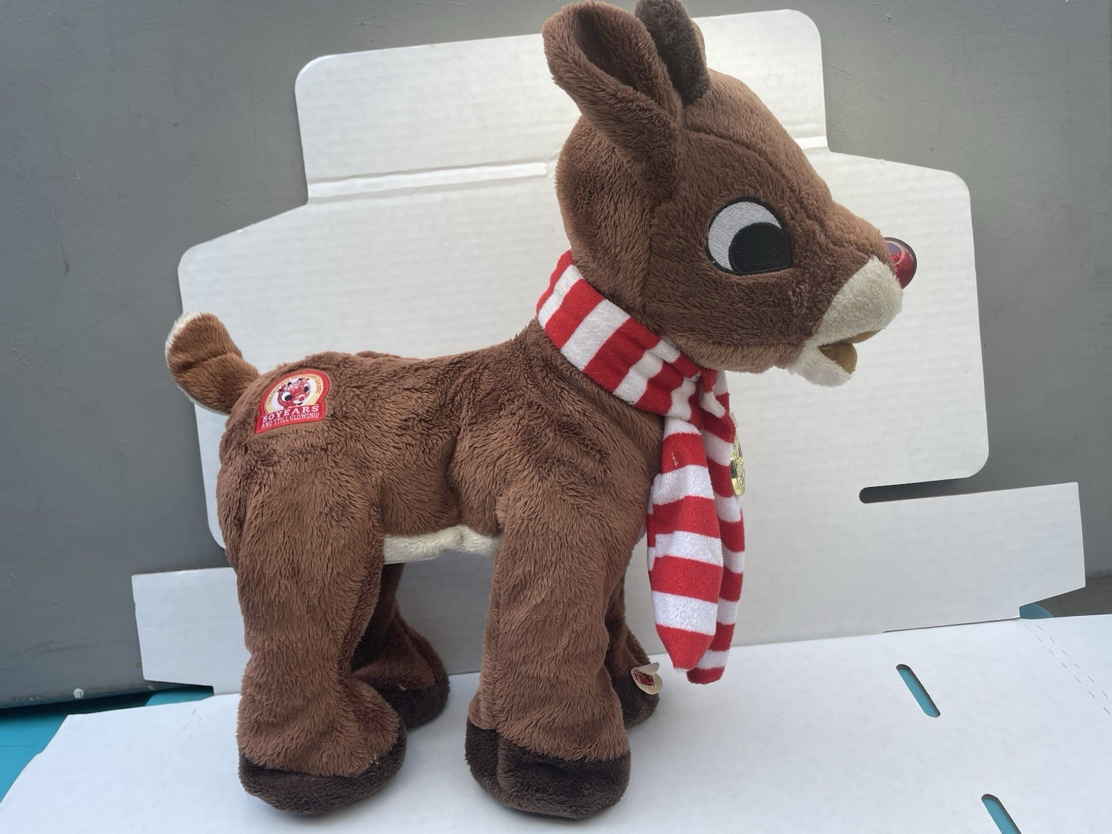 Rudolph the Red Nosed Reindeer 50 Years And Still Glow Sings & Lights Up Plush