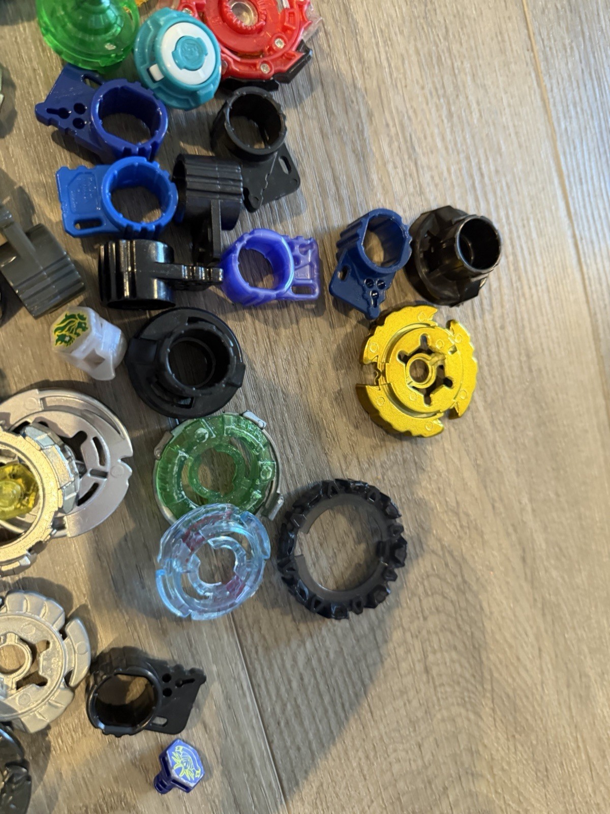 Assorted Lot of Beyblade Bay Blades Launchers & Parts Metal & Plastic