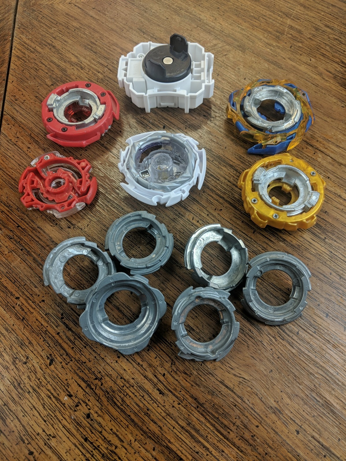 Assorted Small Lot of Beyblade Bay Blades Launchers & Parts Metal & Plastic